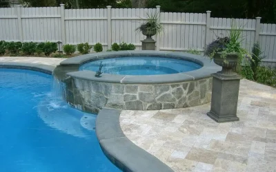 Travertine pool paving with Harkaway bluestone pool coping tiles